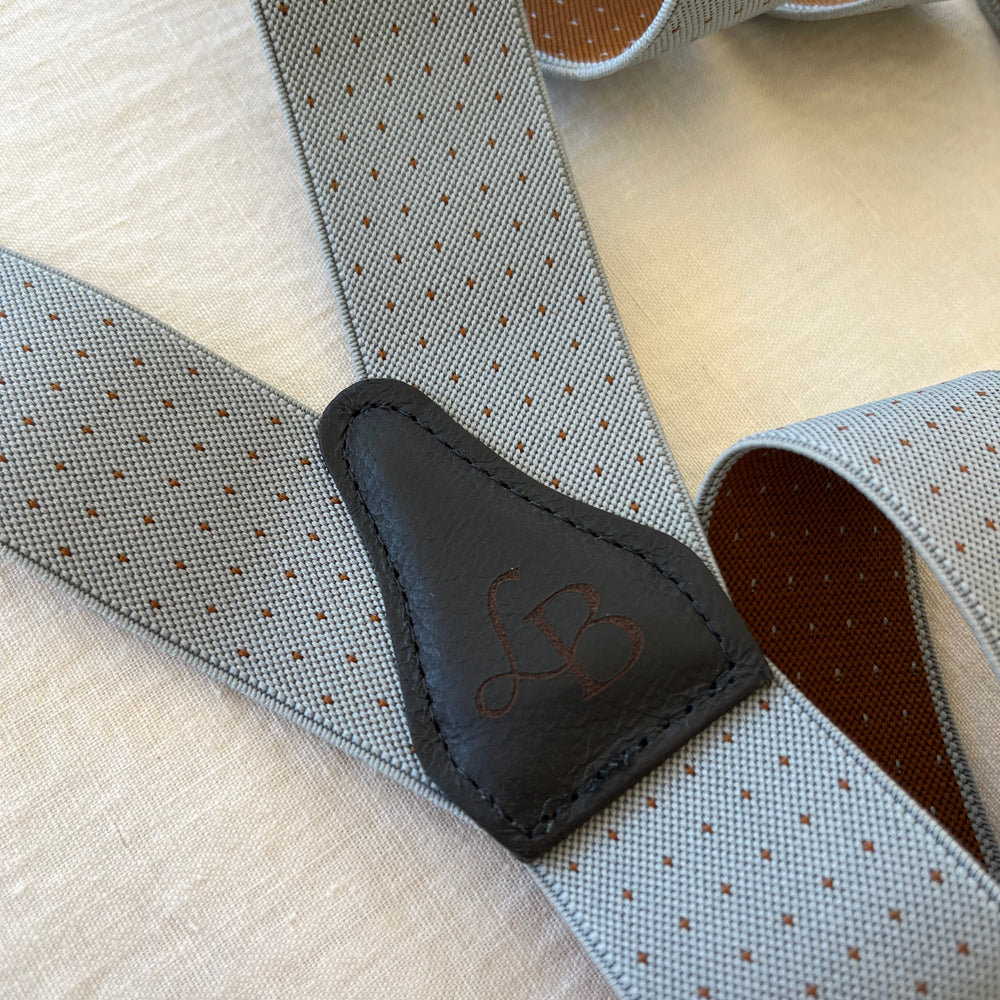 
                  
                    Bretelle gris bleute point etienne dos cuir
                  
                