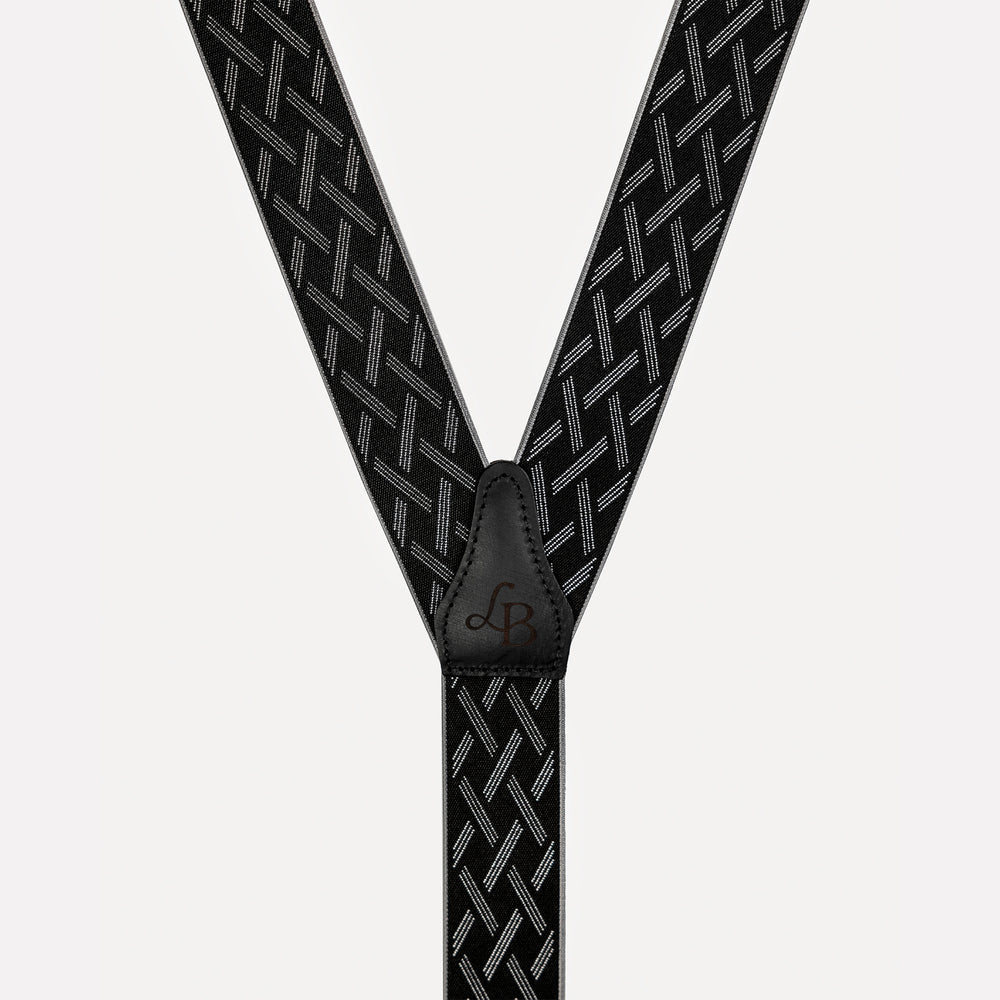 
                  
                    Bretelle noir ligne blanches Maxime cuir
                  
                