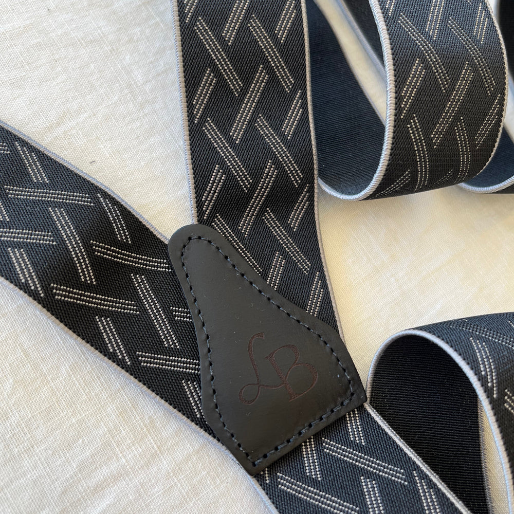 
                  
                    Bretelles homme noir ligne blanches Maxime dos cuir
                  
                